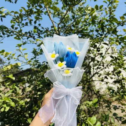 Handmade blue tulip and white daisy pipe cleaner bouquet with pearl bow